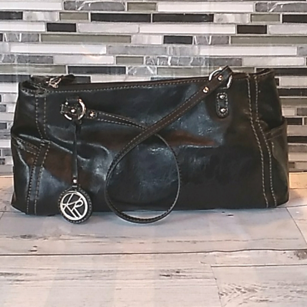 Kim Roger's black leather purse bag 👜
